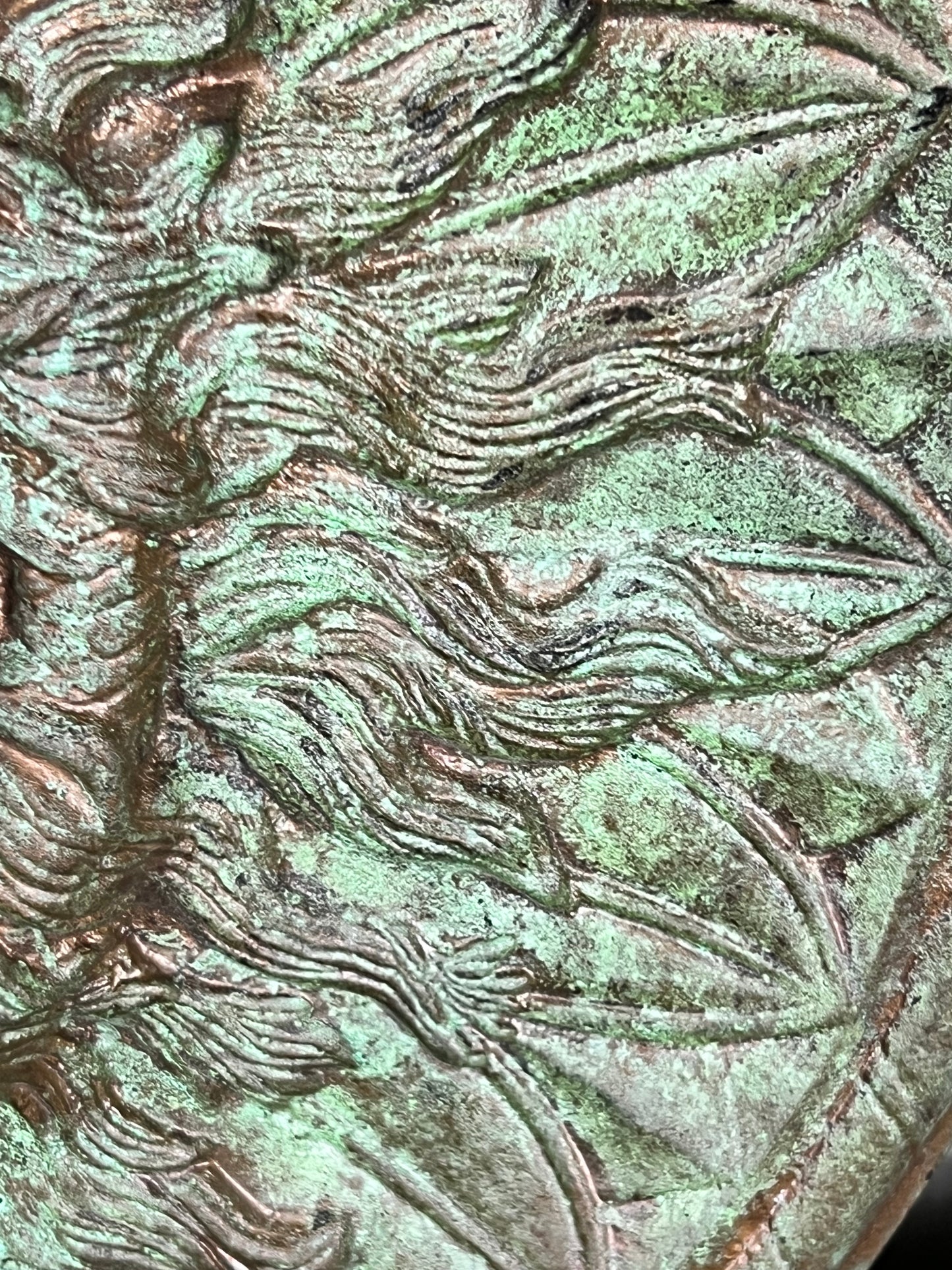 Bronze colour cast aluminium roundel wall decoration